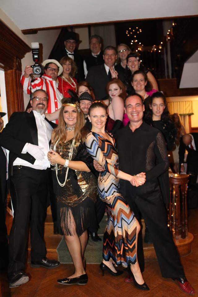 Roaring 20's Surprise Birthday party-guests-posing-on-staircase