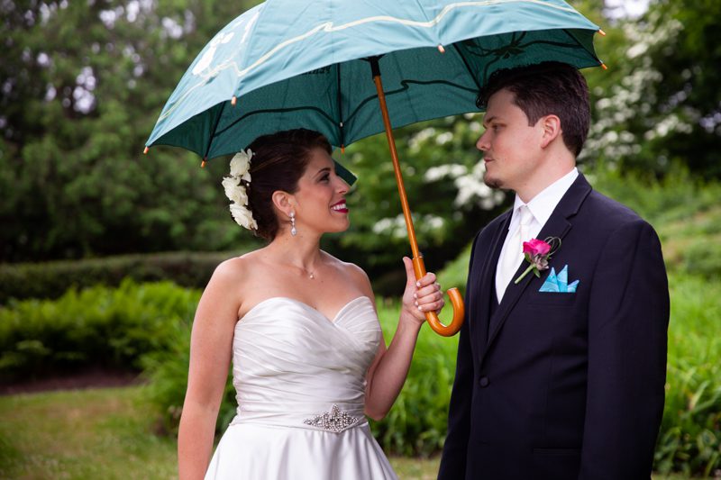 cuban-flair-wedding-rachel-holding-umbrella-over-herself-and-robert