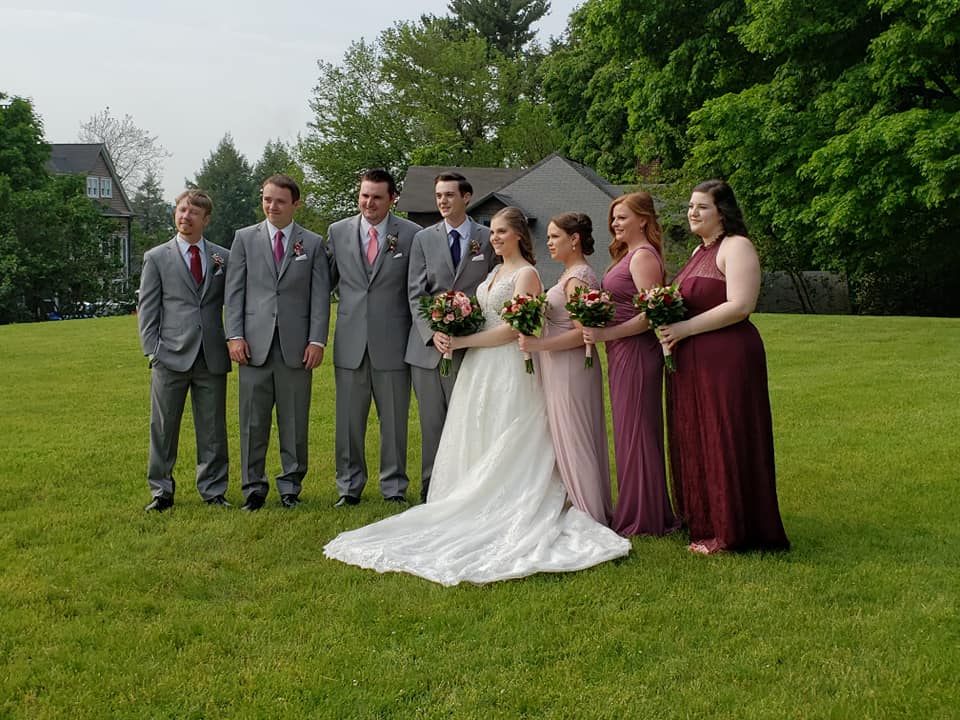 Weddings at Tarrywile Mansion casual-wedding-party-together-on-lawn